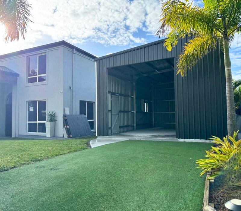 Modern skillion roof shed addition with steel cladding