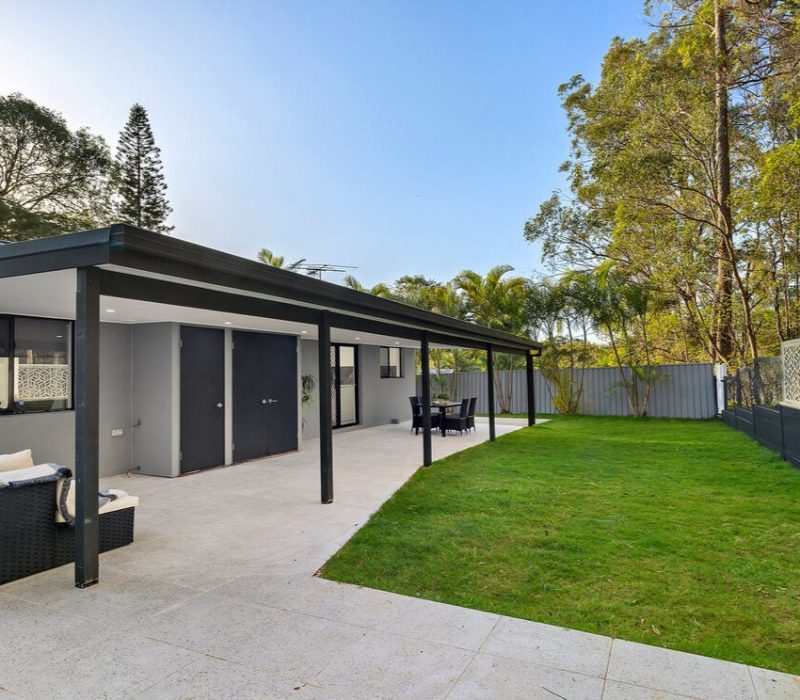Backyard renovation with spacious tiled alfresco area